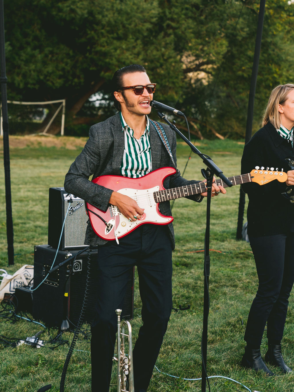 A band performs live music during a wedding reception planned by Kaushay & Co., a event planning company in Utah. Unique wedding ideas reception with live music wedding planning tips #boldandcolorfulweddings #uniqueweddings #memorableweddings #utahweddingplanner